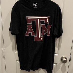 47 Black Tee with Maroon AT Logo